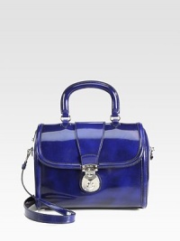 Polished leather bag with flap closure.Top handle, 4 dropDetachable shoulder strap, 16½ dropPush-lock flap closure with zipperProtective metal feetOne inside zip pocketTwo inside open pocketsSatin lining10½W X 8½H X 5½DMade in Italy Polished leather bag with flap closure.Top handle, 4 dropDetachable shoulder strap, 16½ dropPush-lock flap closure with zipperProtective metal feetOne inside zip pocketTwo inside open pocketsSatin lining10½W X 8½H X 5½DMade in Italy