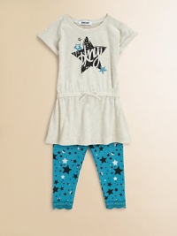 She'll steal the spotlight in this charming play-suit, featuring a sparkling star motif and cool DKNY logo. Tunic CrewneckShort sleevesSnap closure at shoulderDrawstring waist Leggings Elastic waistbandPull-on styleScalloped lace hem57% cotton/38% polyester/5% spandexMachine washImported She'll steal the spotlight in this charming play-suit, featuring a sparkling star motif and cool DKNY logo. Tunic CrewneckShort sleevesSnap closure at shoulderDrawstring waist Leggings Elastic waistbandPull-on styleScalloped lace hem57% cotton/38% polyester/5% spandexMachine washImported