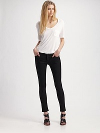 A rich black wash in clingy stretch denim leggings.THE FITBody-hugging fit from waist to ankle Mid rise Inseam, about 31THE DETAILSZip fly Button waist with belt loops Front scoop pockets and patch coin pocket with rivets Back patch pockets Signature patch at waist 44% rayon/29% cotton/25% cupro/2% polyurethane Machine wash Made in USA of imported fabric A rich black wash in clingy stretch denim leggings.THE FITBody-hugging fit from waist to ankle Mid rise Inseam, about 31THE DETAILSZip fly Button waist with belt loops Front scoop pockets and patch coin pocket with rivets Back patch pockets Signature patch at waist 44% rayon/29% cotton/25% cupro/2% polyurethane Machine wash Made in USA of imported fabric