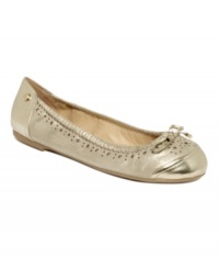 Tommy Hilfiger's Babby ballet flats feature perforated dots all along the perfimeter of the vamp and are topped with a small bow at the toe. Tommy Hilfiger's Babby ballet flats feature perforated dots all along the perfimeter of the vamp and are topped with a small bow at the toe.