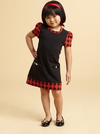 With a houndstooth pattern at the collar, sleeves and hem, this stunning shift dress gives the illusion of two pretty pieces.Scoop neckBack button closureShort puffed sleevesFront welt pocketsFully lined54% polyester/46% cottonMachine washImported With a houndstooth pattern at the collar, sleeves and hem, this stunning shift dress gives the illusion of two pretty pieces.Scoop neckBack button closureShort puffed sleevesFront welt pocketsFully lined54% polyester/46% cottonMachine washImported