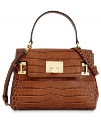 Smile crocodile. Undecidedly chic, this posh croc-embossed satchel from MICHAEL Michael Kors is this season's standout style. Crafted from sumptuous leather with signature golden hardware, it's an effortless way to add elegance to any ensemble. Smile crocodile. Undecidedly chic, this posh croc-embossed satchel from MICHAEL Michael Kors is this season's standout style. Crafted from sumptuous leather with signature golden hardware, it's an effortless way to add elegance to any ensemble.