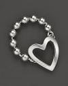 Engraved with logo text, a cutout heart adorns a beaded ring band. From Gucci.