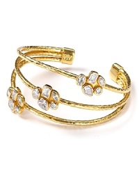 Don't settle just one crystal: opt for Melinda Maria's crystal cluster cuff. Flaunting hammered gold, the multi-stone style commands attention from cocktail hour to fabulous fêtes. Don't settle just one crystal: opt for Melinda Maria's crystal cluster cuff. Flaunting hammered gold, the multi-stone style commands attention from cocktail hour to fabulous fêtes.