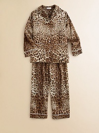 Buttery soft, silk-blend pajamas in a button-front silhouette with patch pockets, contrast piping and a bold leopard print pattern.Notched collarLong sleevesButton-frontFront patch pocketsElastic hem93% silk/7% spandexDry cleanImported Please note: Number of buttons may vary depending on size ordered. 