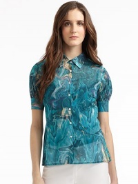 THE LOOKAllover abstract printPoint collarButton frontSlightly puffed short sleevesTHE FITAbout 25 from shoulder to hemTHE MATERIAL92% silk/8% elastaneCARE & ORIGINDry cleanImportedModel shown is 5'10½ (179cm) wearing US size Small. THE LOOKAllover abstract printPoint collarButton frontSlightly puffed short sleevesTHE FITAbout 25 from shoulder to hemTHE MATERIAL92% silk/8% elastaneCARE & ORIGINDry cleanImportedModel shown is 5'10½ (179cm) wearing US size Small.