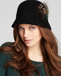 For a chic twist on a '50s-style cloche, August Accessories adds a colorful peacock feather. For a chic twist on a '50s-style cloche, August Accessories adds a colorful peacock feather.