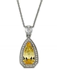 Canary yellow sings in this pave-framed pendant necklace from Eliot Danori. Crafted from silver-tone brass and cubic zirconia (6 ct. t.w.), and surrounded by sparkling accents, the pendant makes a bold statement. Approximate length: 16 inches + 2-inch extender. Approximate drop: 1 inch. Canary yellow sings in this pave-framed pendant necklace from Eliot Danori. Crafted from silver-tone brass and cubic zirconia (6 ct. t.w.), and surrounded by sparkling accents, the pendant makes a bold statement. Approximate length: 16 inches + 2-inch extender. Approximate drop: 1 inch.