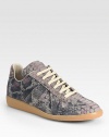 Take a step forward into high-style with this python-printed lace-up style of smooth suede.Printed suede upperLeather liningPadded insoleRubber sole Made in Italy