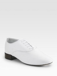 Classic leather oxford styling with a sleek, feminine silhouette. Stacked heel, about ¾ (20mm) Lace-up front Fine-grained leather Leather sole Made in FranceOUR FIT MODEL RECOMMENDS ordering true size.. Classic leather oxford styling with a sleek, feminine silhouette. Stacked heel, about ¾ (20mm) Lace-up front Fine-grained leather Leather sole Made in FranceOUR FIT MODEL RECOMMENDS ordering true size..
