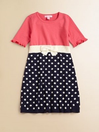 Polka dots and a charming bow breathe new life into this charming knit frock.ScoopneckShort sleeves with ruffled cuffsPullover styleWaistband with bow detailCottonMachine washImported Polka dots and a charming bow breathe new life into this charming knit frock.ScoopneckShort sleeves with ruffled cuffsPullover styleWaistband with bow detailCottonMachine washImported