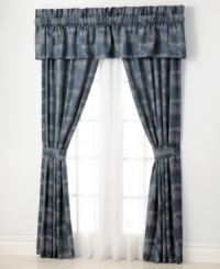 An ombre dye pattern of deep blue and white creates a soft, misty design upon this Indigo Ombre window panel pair from Tommy Bahama. Layer with its coordinating valance for the perfect sea-inspired bedding backdrop. Includes tiebacks. An ombre dye pattern of deep blue and white creates a soft, misty design upon this Indigo Ombre window panel pair from Tommy Bahama. Layer with its coordinating valance for the perfect sea-inspired bedding backdrop. Includes tiebacks.