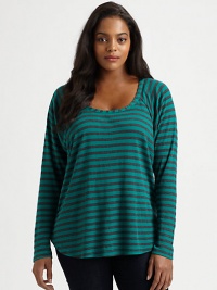 Classic stripes meet an undeniably feminine silhouette with athletic appeal. This raglan top goes perfectly with dark-denim jeans.ScoopneckRaglan sleevesCurved hemPull-on styleAbout 27 from shoulder to hemPolyester/micro modal/supima cottonMachine washMade in USA Classic stripes meet an undeniably feminine silhouette with athletic appeal. This raglan top goes perfectly with dark-denim jeans.ScoopneckRaglan sleevesCurved hemPull-on styleAbout 27 from shoulder to hemPolyester/micro modal/supima cottonMachine washMade in USA