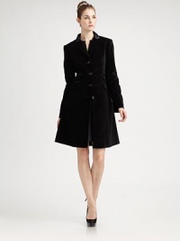 This beautifully tailored evening coat in rich velvet with satin trim has equestrian touches and a gracefully flared skirt.Satin collarNotched lapelsFitted seamed bodiceFour-button frontLong sleeves with button detail at cuffsFour front flap pocketsFlared skirtBack satin half beltBack princess seamsFully linedAbout 37 from shoulder to hemCotton/spandexDry cleanImportedSIZE & FITModel shown is 5'9 (175cm) wearing US size 4. This beautifully tailored evening coat in rich velvet with satin trim has equestrian touches and a gracefully flared skirt.Satin collarNotched lapelsFitted seamed bodiceFour-button frontLong sleeves with button detail at cuffsFour front flap pocketsFlared skirtBack satin half beltBack princess seamsFully linedAbout 37 from shoulder to hemCotton/spandexDry cleanImportedSIZE & FITModel shown is 5'9 (175cm) wearing US size 4.