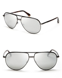 With a leather jacket and jeans, these metal aviators charge your look with Tom Ford's iconic style. With a leather jacket and jeans, these metal aviators charge your look with Tom Ford's iconic style.
