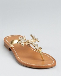 Take a trip to the seaside with these IVANKA TRUMP sandals, adorned with seahorse and starfish details in shimmering rhinestones. Take a trip to the seaside with these IVANKA TRUMP sandals, adorned with seahorse and starfish details in shimmering rhinestones.