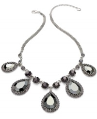 Alfani's statement necklace is crafted from hematite tone mixed metal with an array of black and gray glass stones for an alluring effect. Crafted in hematite tone mixed metal. Approximate length: 18 inches + 3-inch extender. Approximate drop: 1-1/2 inches. Alfani's statement necklace is crafted from hematite tone mixed metal with an array of black and gray glass stones for an alluring effect. Crafted in hematite tone mixed metal. Approximate length: 18 inches + 3-inch extender. Approximate drop: 1-1/2 inches.