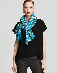 Cozy cashmere takes an unexpected turn with DIANE von FURSTENBERG's striking eye-print scarf in teal.