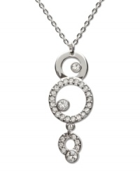 Go around in circles--and out on the town! Get in style with Swarovski's crystal pave circular drop pendant. Setting and chain crafted in silver tone mixed metal. Approximate length: 15 inches. Approximate drop: 1-1/4 inches. Go around in circles--and out on the town! Get in style with Swarovski's crystal pave circular drop pendant. Setting and chain crafted in silver tone mixed metal. Approximate length: 15 inches. Approximate drop: 1-1/4 inches.