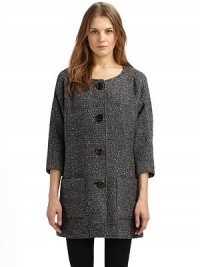 A simple collarless shape in a luxurious wool blend, with dolman sleeves and rustic wooden buttons.Round neckline Seamed yoke, front and back ¾ kimono sleeves Button front Dual patch pockets at front Fully lined About 33 from shoulder to hem 78% wool/18% polyester/4% other fibers Dry clean Made in USA A simple collarless shape in a luxurious wool blend, with dolman sleeves and rustic wooden buttons.Round neckline Seamed yoke, front and back ¾ kimono sleeves Button front Dual patch pockets at front Fully lined About 33 from shoulder to hem 78% wool/18% polyester/4% other fibers Dry clean Made in USA