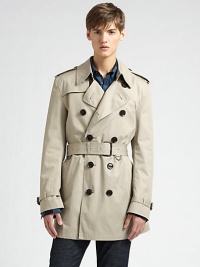 Sleek rainwear with a heritage touch, designed with the signature craftsmanship and style you expect. Double-breasted buttonfront Shoulder epaulets Rear button shoulder flap Belted waist Cuff tabs Side slash pockets Rear vent About 35 from shoulder to hem Cotton with nylon trim Dry clean Imported Sleek rainwear with a heritage touch, designed with the signature craftsmanship and style you expect. Double-breasted buttonfront Shoulder epaulets Rear button shoulder flap Belted waist Cuff tabs Side slash pockets Rear vent About 35 from shoulder to hem Cotton with nylon trim Dry clean Imported