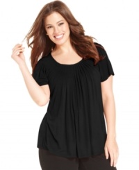A pleated neckline lends an elegant feel to this ultra-flattering short sleeve plus size top by Style&co. A pleated neckline lends an elegant feel to this ultra-flattering short sleeve plus size top by Style&co.