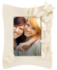 The essence of whimsy, this Lenox Flutter picture frame will lift your spirits with gold-tipped butterflies and elegant banding in timeless ivory porcelain. The essence of whimsy, this Lenox Flutter picture frame will lift your spirits with gold-tipped butterflies and elegant banding in timeless ivory porcelain.