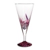 Each wine glass is carefully hand-blown in Florence by experienced craftsmen who perform a ten-step, six-hour process, blending Venetian color chips with silvery sparkles for a scintillating confluence of shimmer and hue.