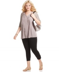 Prettify your look with Style&co.'s three-quarter sleeve plus size top, finished by a pleated front. Prettify your look with Style&co.'s three-quarter sleeve plus size top, finished by a pleated front.