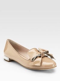 Glossy patent leather in an easy shape, topped with a bow and jewel-embellished heel. Patent leather upperLeather lining and solePadded insoleImportedOUR FIT MODEL RECOMMENDS ordering one half size up as this style runs small. Glossy patent leather in an easy shape, topped with a bow and jewel-embellished heel. Patent leather upperLeather lining and solePadded insoleImportedOUR FIT MODEL RECOMMENDS ordering one half size up as this style runs small.