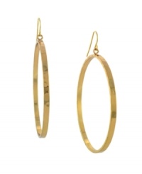Stir up some drama in eye-catching hoops. BCBGeneration takes style to the next level in large drop hoops crafted in gold tone mixed metal. Approximate diameter: 2-1/2 inches. Stir up some drama in eye-catching hoops. BCBGeneration takes style to the next level in large drop hoops crafted in gold tone mixed metal. Approximate diameter: 2-1/2 inches.