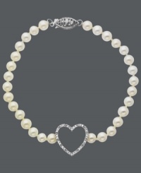Put your heart on the line. This romantic style features a sweet strand of cultured freshwater pearls (4-1/2 mm) and a diamond-covered, cut-out heart pendant (1/10 ct. t.w.). Approximate length: 16 inches. Approximate drop: 1/2 inch. Put your heart on the line. This romantic style features a sweet strand of cultured freshwater pearls (4-1/2 mm) and a diamond-covered, cut-out heart pendant (1/10 ct. t.w.). Approximate length: 16 inches. Approximate drop: 1/2 inch.