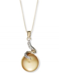 The golden touch. This rich pendant features a cultured golden South Sea pearl (12-13 mm) and swirls of round-cut diamond accents. Set in a 14k gold. Approximate length: 18 inches. Approximate drop: 1 inch. The golden touch. This rich pendant features a cultured golden South Sea pearl (12-13 mm) and swirls of round-cut diamond accents. Set in a 14k gold. Approximate length: 18 inches. Approximate drop: 1 inch.