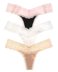 A super soft thong with thick lace trim at legs for a flattering silhouette. Style #976103 A super soft thong with thick lace trim at legs for a flattering silhouette. Style #976103