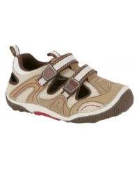 He'll feel like he's walking on sunshine with these comfy Stride Rite shoes made to help decrease falling. He'll feel like he's walking on sunshine with these comfy Stride Rite shoes made to help decrease falling.