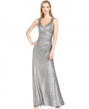 A metallic finish gives this Calvin Klein gown a radiant glow. Beading at the straps is another touch of shimmer.