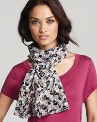This playful Charlotte Sparre scarf features a feminine confetti print from a distance-up close, its skull print lends it edge. This playful Charlotte Sparre scarf features a feminine confetti print from a distance-up close, its skull print lends it edge.