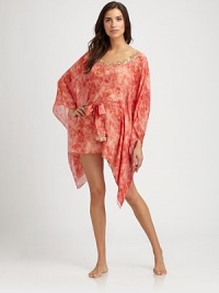 With delicate embroidery, this light-as-air silk coverup is short and definitely sweet.V-neckSelf-tieSilkDry cleanImported With delicate embroidery, this light-as-air silk coverup is short and definitely sweet.V-neckSelf-tieSilkDry cleanImported