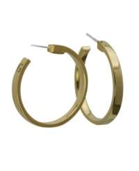Snap up a style classic that adds an instant boost to your look. GUESS's traditional hoop earring features a gold tone mixed metal setting. Approximate diameter: 1 inch. Snap up a style classic that adds an instant boost to your look. GUESS's traditional hoop earring features a gold tone mixed metal setting. Approximate diameter: 1 inch.