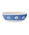 Vintage charm meets modern durability in the Farmhouse Touch amuse bouche bowl, featuring fresh white blooms on cornflower-blue porcelain from Villeroy & Boch.