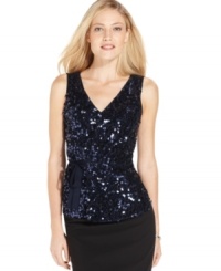 T Tahari's sequined top gets a festive finishing touch from a ribbon bow at the waist. T Tahari's sequined top gets a festive finishing touch from a ribbon bow at the waist.