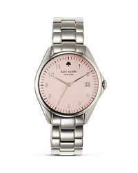 A classic watch design from kate spade new york is extra striking in stainless steell. A bold linked bracelet and rose-colored face add an extra stroke of polish. A classic watch design from kate spade new york is extra striking in stainless steell. A bold linked bracelet and rose-colored face add an extra stroke of polish.