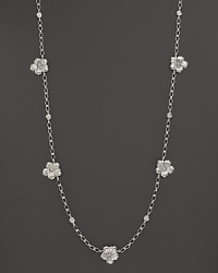 Delicate gardenias, captured at the height of their beauty in sterling silver, bloom on this necklace from Buccellati. Delicate gardenias, captured at the height of their beauty in sterling silver, bloom on this necklace from Buccellati.