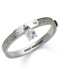 Lock up a new look! This darling Juicy Couture bracelet highlights a skinny padlock with glass stone accent. Bracelet embellished with pave accents. Finished with a box tongue closure. Crafted in silver tone mixed metal. Approximate diameter: 2-3/8 inches. Lock up a new look! This darling Juicy Couture bracelet highlights a skinny padlock with glass stone accent. Bracelet embellished with pave accents. Finished with a box tongue closure. Crafted in silver tone mixed metal. Approximate diameter: 2-3/8 inches.