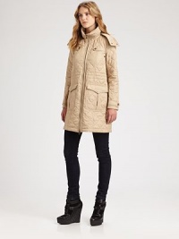 Quilted to cozy-chic perfection, this sleek jacket features military-inspired gunflaps and convenient pockets.Stand collarDetachable hoodFront zipperBack yokeFully linedAbout 28 from shoulder to hemPolyesterDry cleanMade in Italy Model shown is 5'9½ (176cm) wearing US size Small. Quilted to cozy-chic perfection, this sleek jacket features military-inspired gunflaps and convenient pockets.Stand collarDetachable hoodFront zipperBack yokeFully linedAbout 28 from shoulder to hemPolyesterDry cleanMade in Italy Model shown is 5'9½ (176cm) wearing US size Small.
