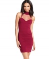 Sheer mesh insets add vixen attitude to this red-hot bandage dress from Baby Phat! (Clearance)