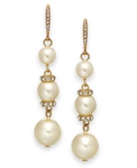 A stylish triple play, by Charter Club. These drop earrings flaunt a triple drop silhouette with acrylic pearls and gold tone spacers embellished with glass accents. Crafted in gold tone mixed metal. Approximate drop: 2-1/3 inches. A stylish triple play, by Charter Club. These drop earrings flaunt a triple drop silhouette with acrylic pearls and gold tone spacers embellished with glass accents. Crafted in gold tone mixed metal. Approximate drop: 2-1/3 inches.