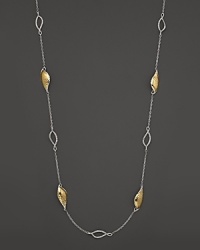Organically textured sterling silver beads form a long, dramatic necklace from the John Hardy Palu Kapal collection. Organically textured sterling silver beads form a long, dramatic necklace from the John Hardy Palu Kapal collection.