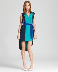 Articulated in supple silk and finished with a dramatic high/low hem, this BCBGMAXAZRIA dress nails the color-block trend to showstopping effect. Articulated in supple silk and finished with a dramatic high/low hem, this BCBGMAXAZRIA dress nails the color-block trend to showstopping effect.