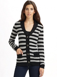 THE LOOKStriped throughoutSolid color shawl collarButton frontLong sleeves with solid, ribbed cuffsDual patch pocketsRibbed hemTHE FITAbout 26 from shoulder to hemTHE MATERIALCashmereCARE & ORIGINDry cleanImported THE LOOKStriped throughoutSolid color shawl collarButton frontLong sleeves with solid, ribbed cuffsDual patch pocketsRibbed hemTHE FITAbout 26 from shoulder to hemTHE MATERIALCashmereCARE & ORIGINDry cleanImported